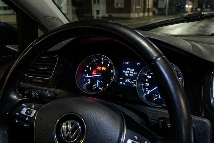 brake warning light on dashboard of a car