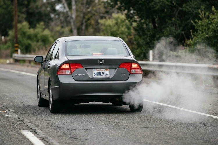 Car pulling to one side on a straight road, illustrating alignment and steering issues