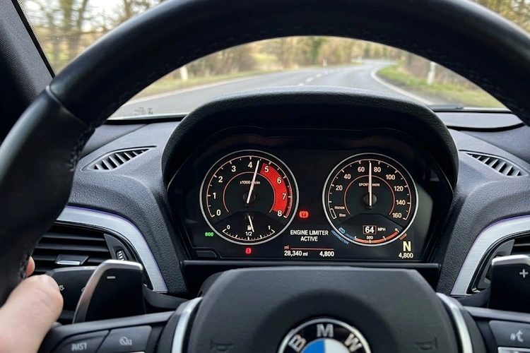 Car tachometer showing RPM needle stuck at 3000 RPM — car won't rev past certain RPM