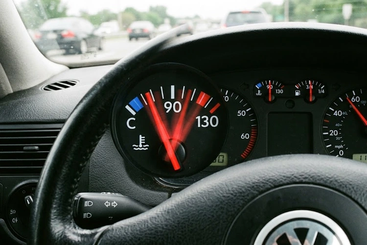 Mechanic inspecting battery terminal connections after a car won't start following battery replacement