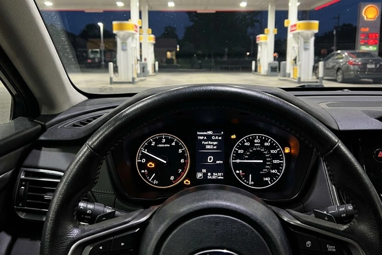 Check engine light on after gas fill up illuminated on a car dashboard