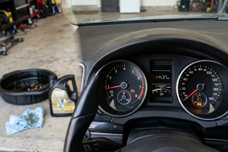 Check engine light illuminated on car dashboard after an oil change