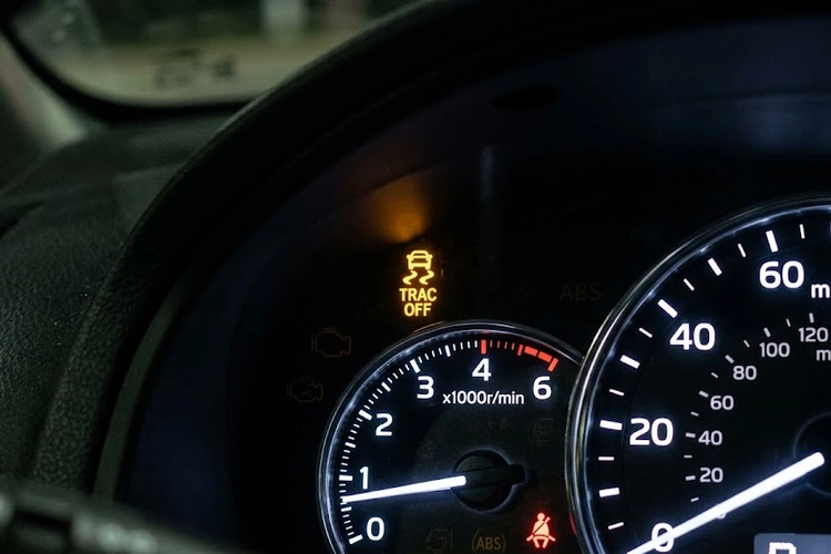 Traction control light on illuminated amber on instrument cluster dashboard