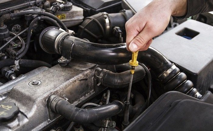 Warning signs of low transmission fluid in a car